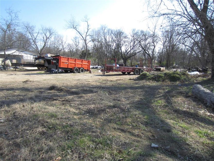 Build your next project in Sulphur Springs! This .184-acre unimproved lot (approx. 8,000 sq ft) is located within the city limits with access to city sewer and city water. The property includes an old dilapidated structure and is approved for the City of Sulphur Springs rebate program related to removal of the home (buyer to verify all details). Zoned for residential or multifamily potential, this is an affordable opportunity for redevelopment or investment.