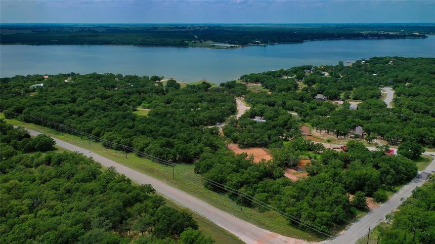 Three good size building lots tucked among shaded tree coverage. Country life with simpler ways awaits your decision. Roomy lots for the home & a place to build a shop. Lake Nocona is within an old saying “as crow fly’s” view. The location of the boat ramp to these lots is ideal. Pack some snacks, lawn chairs, beverages & stroll over to enjoy some family time under the trees, go swimming off the dock, take the boat or watercraft on the lake & make a day of it. Golf carts are the means of transportation which makes things easier. Need a quick meal check out Bears Café at the gate. The community offers golf, air strip, camping, fishing, & security at the gate. Pleasant drive to Nocona for needed items. Shop around downtown, grab a good meal at one of our local restaurants which will always include some good conversation with the locals. Check the calendar for the seasonal events that you won’t want to miss. Stop by one of the wineries in the surrounding area or slip across the river bridge to enjoy one of the Oklahoma Casinos. Who said small communities aren’t happening places. This rural area proves to be a good time. Coming soon will be the newly remodeled Clubhouse, 19th Hole, Pro Shop, & with fingers crossed incorporate some golf tournaments if that is possible. Lots of positive turn-a-rounds for the HOA in recent coming dates. Access with an agent only. A new survey will need to be completed to determine exact lot size & boundaries. 

There are 3 groups of lot opportunities to purchase and if more privacy or space is needed there is a total of 10 lots that can be purchased as a bundle. Pick your group, settle on it, & make this happen!