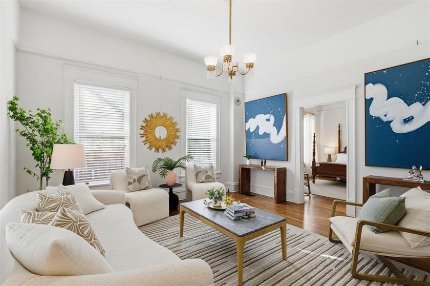 This grand 1903 Greek Revival is located in sought-after Historic Fairmount, boasts 3,088sf of living space in the main house, and sits on a nearly quarter-acre double lot. A welcoming oversized front porch ushers you inside to 11' ceilings and original hardwood floors, which create an impressive yet warm atmosphere. The abundant natural light flowing through oversized windows creates a bright and airy feel. This home is truly one-of-a-kind with a rare 4-car garage, complete with TWO 466sf studio apartments above. Imagine using this space as an income-generating rental or a guest house for your friends and family. The possibilities are endless! When it's time to venture out, you'll love the convenience of being in close proximity to Magnolia Ave's shopping and dining. Fairmount is known for its vibrant atmosphere, historic charm, and abundance of community events. Whether you're in the mood for a night out or a quiet evening in, this home has it all.