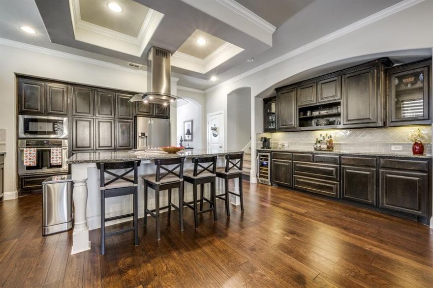 Welcome this stunning 4 bedroom 3 bath home in the most desirable highly sought-after gated community Highlands Glenn of Roanoke. it's thoughtfully designed living space step inside to an inviting open floor plan featuring high ceilings, natural light and a spacious living space anchored by a cozy fireplace. The gourmet kitchen boasts stainless appliances, granite counter tops, abundant cabinetry and a large island perfect for entertaining. The primary suite bathroom is absolutely spa-like with soaking tub and walk-in shower custom made and dual sinks. Additional bedrooms are generously sized with ample closet space. Upstairs offers a versatile game or media room. Outside enjoy your landscaped yard with covered patio, stoned walk way and a gas line for hookup for grilling gatherings. Residents benefit from a welcoming neighborhood with parks, trails and close proximity to top-rated Northwest ISD, Beck Elementary and Medlin Middle Schools. also shopping, dinning and easy access to major highways, blends comfort, convince and style in one exceptional package. Information deemed reliable but not guaranteed buyer and buyers agent to verify all information. This entire Home is backed up by GENERAC upgraded and maintained. Ring doorbell and 2 outdoor security cameras with lighted motion sensors, Radiant attic, Class A upgraded shingles, smart thermostats, built-in wine cooler, room for freezer on garage, extended garage length, custom backsplash, turfed waterproof carpet pad and 4'x3' grill space. Added floor plug to study and Hunter Douglas Blinds and Custom plantation shutters, under cabinet lighting built-in surround sound in main living, primary bathroom and game room. Oversized tub in primary bathroom and prewired for jacuzzi tub. Community pool and no PID or MUD. Welcoming and landscaped with exterior natural stones. Embrace an elevated lifestyle in a rare opportunity in one of the most desirable neighborhood. Book BROKER BAY or SHOWING TIME.