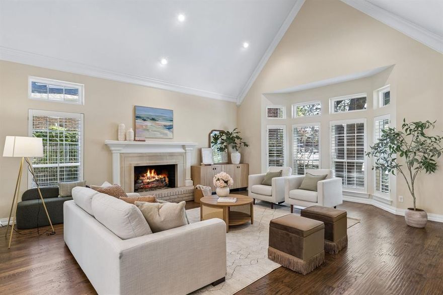 Tucked away on a quiet, tree-canopied cul-de-sac, this beautifully updated 4-bedroom, 4-bath home offers the rare feeling of country living in the heart of the city. Inside, you’re welcomed by rich hardwood floors, classic millwork, and a dramatic staircase that sets an elegant tone from the moment you enter. Designed for both everyday comfort and effortless entertaining, the home features generous living spaces, large bedrooms, and an ideal layout that includes a dedicated home office. At the heart of the home is a stunning, chef-inspired kitchen—fresh, bright, and thoughtfully finished. Crisp shaker-style cabinetry stretches to the ceiling for a clean, custom look, complemented by quartz countertops, brushed-gold hardware, and a bold herringbone tile backsplash that adds a designer edge. A gas cooktop and double ovens make hosting easy, while expansive prep space and a functional layout keep everything within reach. The kitchen opens beautifully to the living and breakfast areas, creating a natural gathering spot for family and friends. The primary suite is a true retreat, highlighted by a refreshed bath with spa-inspired finishes. Out back, enjoy a serene greenbelt backdrop—a peaceful view that elevates morning coffee, weekend gatherings, and evenings at home. Perfectly positioned just moments from neighborhood favorites, including the White Rock Creek Trail, Fair Oaks Tennis Center, shopping, dining, and DART access, this home delivers the best of Dallas living—private, connected, and beautifully upgraded.