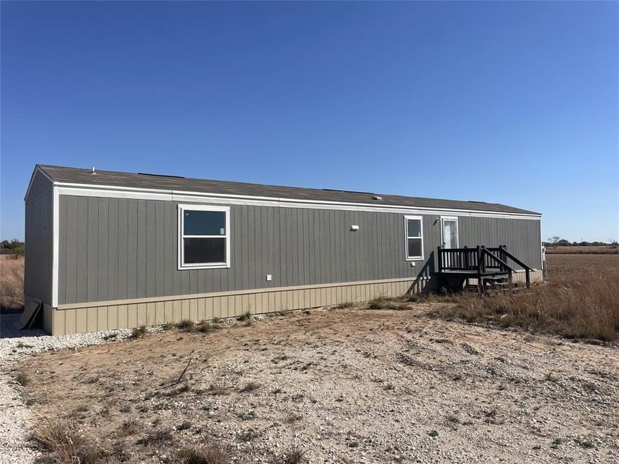 This brand new 3-bedroom, 2-bathroom, 902-square-foot single-wide mobile home sits on a full acre in the desirable Hawley ISD. The property is already equipped with a septic system and water, and the home comes with a new refrigerator, oven, and air conditioning. Located close to the new data center, this location offers both convenience and strong future potential. The home is completely move-in ready, providing modern, efficient living in a peaceful rural setting with plenty of room to spread out. Opportunities like this are rare—secure a new home on acreage in a growing area while you can.