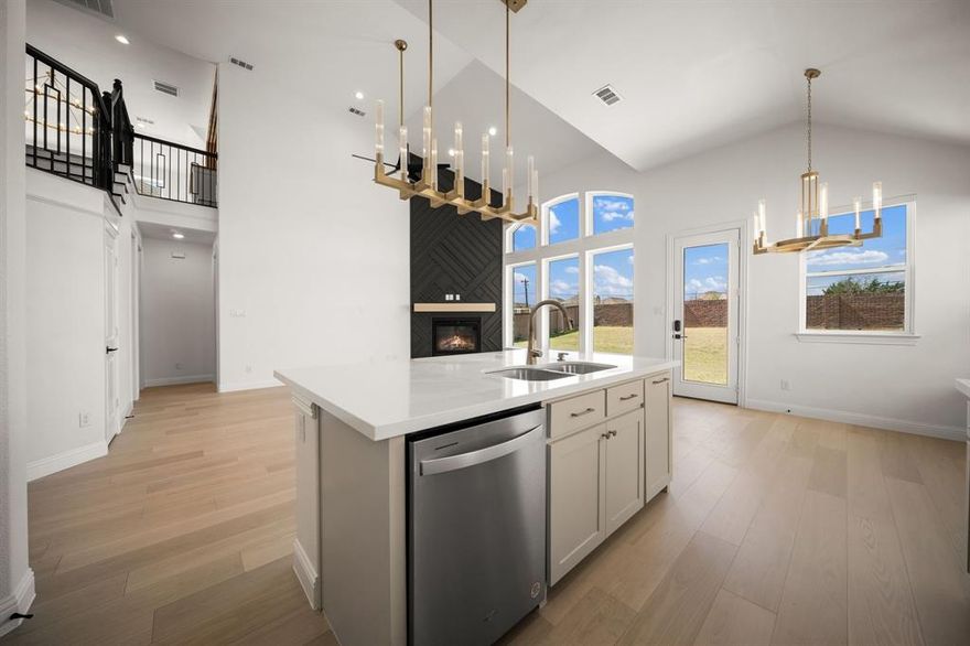 Over $60K+ in high-end designer upgrades have transformed this property into a clean, modern, luxury living experience. From the moment you walk in, you feel the difference—white oak hardwood flooring runs throughout the entire home, replacing all carpet, paired with a fully repainted interior in a crisp, timeless white palette.

The staircase has been elevated into a statement piece with custom LED motion lighting, while five thoughtfully designed accent walls add depth and character across the main living areas, including the great room, staircase, and media space. The kitchen has been completely reimagined with custom-painted cabinetry inside and out, upgraded with premium Jeffrey Alexander hardware, and anchored by high-end GE Café appliances, including a matching white refrigerator—blending function with a refined, cohesive aesthetic.

Bathrooms have been taken to the next level with two fully remodeled spaces featuring marble and porcelain finishes, custom glass-enclosed showers, upgraded hardware, and LED-lit vanity mirrors that deliver a true spa-like feel.

Every detail was considered—brand new designer light fixtures, custom chandeliers, and high-end Ferguson ceiling fans have been installed throughout the entire home, creating a consistent elevated finish from room to room.

To complete the experience, custom roller shades have been installed throughout, with blackout options in bedrooms and light-filtering shades in main living areas for both comfort and privacy.