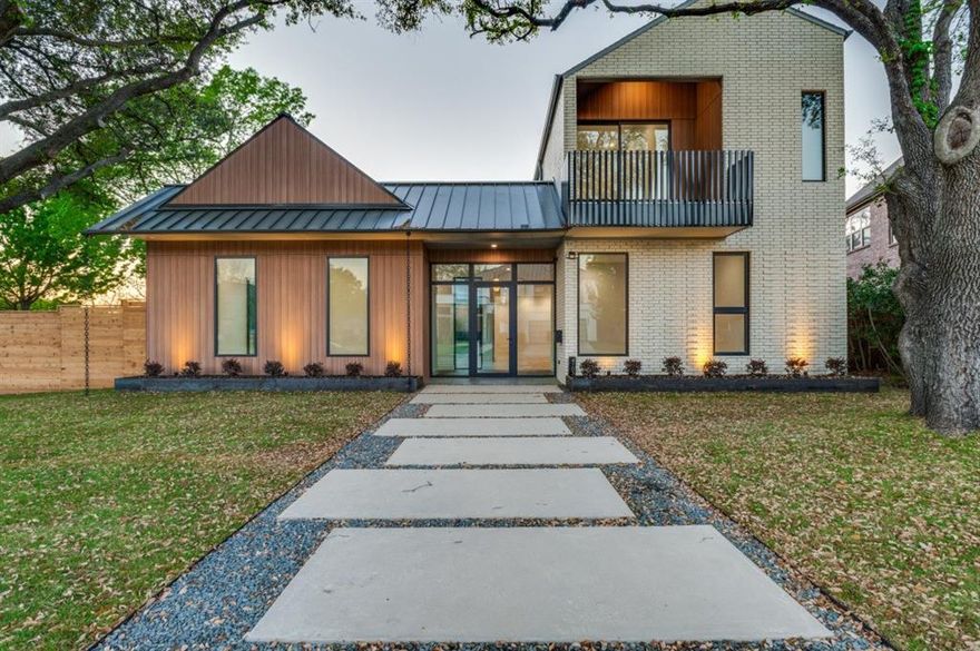 A striking new construction home by award-winning team Lardner Custom Homes and architect Far+Dang, this modern residence blends architectural design with everyday livability. Set on a magnificent, oversized, tree-filled lot in Midway Hollow, the home is framed by mature oak trees and thoughtfully designed landscaping, creating a private and inviting setting.  

The exterior showcases a standing seam metal roof, custom fencing, and clean modern lines, while expansive 10’ windows and sliding doors fill the home with natural light and seamlessly connect indoor and outdoor living. Inside, soaring ceiling heights elevate the space, with 11’ ceilings in the main living areas and dramatic 16’ to 18' gabled ceilings in the primary suite, office, workout room, and guest bedroom.

The open-concept living and kitchen area is both refined and functional, featuring a large island, GE Profile appliance package, custom cabinetry, and a butler’s pantry designed for effortless entertaining. Warm wood accents, smooth finished walls, and custom tile work add depth and texture throughout.

The spacious primary suite offers a private retreat, complete with a spa-inspired bath and custom closet system. Designed for flexibility, the home includes multiple living areas, a dedicated office, workout room, game room, mudroom, and two laundry rooms.  

Outdoor living is equally intentional, with two balconies, a covered patio, and a custom acid-washed walkway, all surrounded by drought-tolerant landscaping for ease of maintenance.

Built with 2x6 framing, engineered slab on piers, and full foam encapsulation, this home delivers exceptional efficiency, quality, and design—crafted to stand apart.