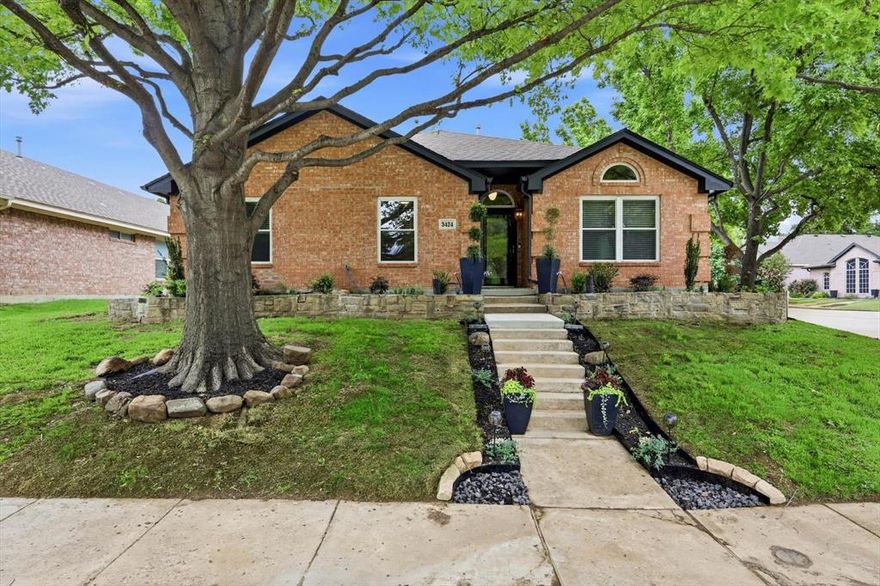 Major updates recently made! This four bedroom, single story, offers a great layout for entertaining or everyday living. Handsome curb appeal on an elevated corner lot with raised stone beds. Filled with natural light, the floor plan offers combined formal and dining rooms, a spacious family room with tiled corner fireplace, a breakfast area and open kitchen with stainless appliances, granite counters and tiled accent walls. The master is separate from the other bedrooms and features a spacious bath with tub and shower, dual vanities and access to the utility room. All bedrooms are nicely sized. The outdoor space is equally wonderful with stone patio, pergola and board-on-board fence. No backyard grass to mow!