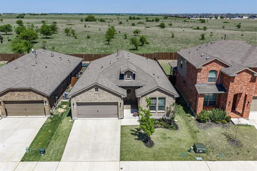 Welcome home! Nestled in the heart of Haslet, this charming home offers the perfect blend of comfort and functionality. Step inside to a cozy, convenient layout with a warm and welcoming living space, ideal for movie nights and making lasting memories. Just off the living room, the kitchen shines with a center island and breakfast bar, built-in cabinetry, and a spacious walk-in pantry, making both everyday living and entertaining a breeze. The peaceful primary suite provides a relaxing retreat, complete with an ensuite bathroom featuring a large walk-in shower, dual sinks, a linen closet, and an impressive walk-in closet. Three additional bedrooms offer incredible flexibility and can be used for loved ones, a workout room, or a serene home office. Out back, enjoy a covered patio and a spacious backyard with no backyard neighbors, offering added privacy and tranquility. With plenty of room for outdoor activities, entertaining, or future upgrades, this home truly has the space and charm to fit a variety of lifestyles. Don’t miss the opportunity to make it yours!