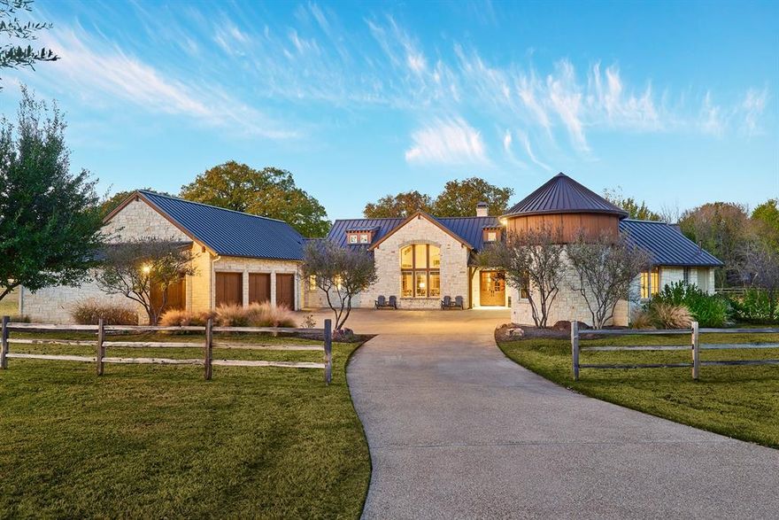 4951 Bridle Bit Road is a 4,828SqFt. 4 bedroom, 5.2 bath Hill Country Contemporary designed by C.A. Nelson on 12+ rolling acres dotted with mature trees, a private pond and 10-acre hay field.  Electronic gate, entry keypad speaker and camera open to reveal a winding drive, hidden from the road by a copse of trees leading to this fabulous estate.

Beyond the stunning main residence is a 6-stall (12x12) custom BarnPros barn with lifetime stain, wash area, office and half bath, a 100x200 covered, lighted arena with retractable windscreens, an auto-sprinkler, WiFi and Internet. A 3-stall Morton loafing shed completes EQ amenities.  For the non-EQ athlete there's a 30x60 sport court.

Community bridle paths reminiscent of Virginia Hunt Country on North, South and West property border.  Irrigation supplied by a private well and a back entrance off Latigo Hills could allow for subdividision (zoning RE-2).