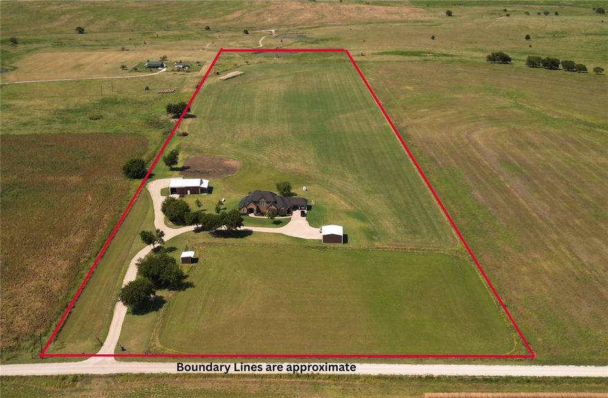 Experience the freedom and potential of 25 acres of open North Texas land, perfectly suited for ranching, livestock, equestrian use, or building out your dream country estate. With expansive pastureland and wide-open views, this property offers endless opportunities to create a custom setup tailored to your needs—whether that’s horses, cattle, additional structures, or simply room to roam.
The land is complemented by a 3-stall barn with covered trailer parking and a large shop with concrete floors and electricity, making it functional and ready for agricultural or recreational use from day one.
A custom-built home sits on the property, offering over 3,600 square feet of living space with an open-concept layout, flexible living areas, and thoughtfully designed features for everyday comfort. While the home provides a strong foundation, the true value lies in the acreage and its versatility.