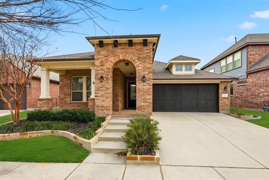 Welcome to this beautifully maintained 4-bed, 3-bath home in Argyle’s coveted Harvest community, offering 2,364 sq ft of thoughtfully designed living space in a prime location within the Argyle Independent School District. Featuring an open floor plan, abundant natural light, and a flexible layout ideal for modern living, this home checks all the boxes for comfort and convenience.
The heart of the home is the chef-inspired kitchen, complete with a large island, granite countertops, stainless-steel appliances, gas cooktop, and built-in desk nook — perfect for meal prep, casual dining, or work-from-home needs. The adjacent living area centers around a cozy gas-log fireplace and flows seamlessly to a covered patio, creating effortless indoor-outdoor living and entertaining options.
The primary suite is a retreat unto itself with dual sinks, a frameless walk-in shower with rainfall shower head, and a generous walk-in closet. Additional bedrooms are spacious and versatile, ideal for family, guests, or a dedicated home office.
Enjoy the outdoors with a covered patio and pergola, excellent yard space, and access to Harvest’s resort-style community amenities including pools, parks, clubhouse, and fitness center. Located near shopping, dining, trails, and top-rated Argyle schools, this home blends everyday lifestyle with strong community appeal — a standout opportunity for buyers seeking move-in ready quality in one of North Texas’ most desirable neighborhoods.