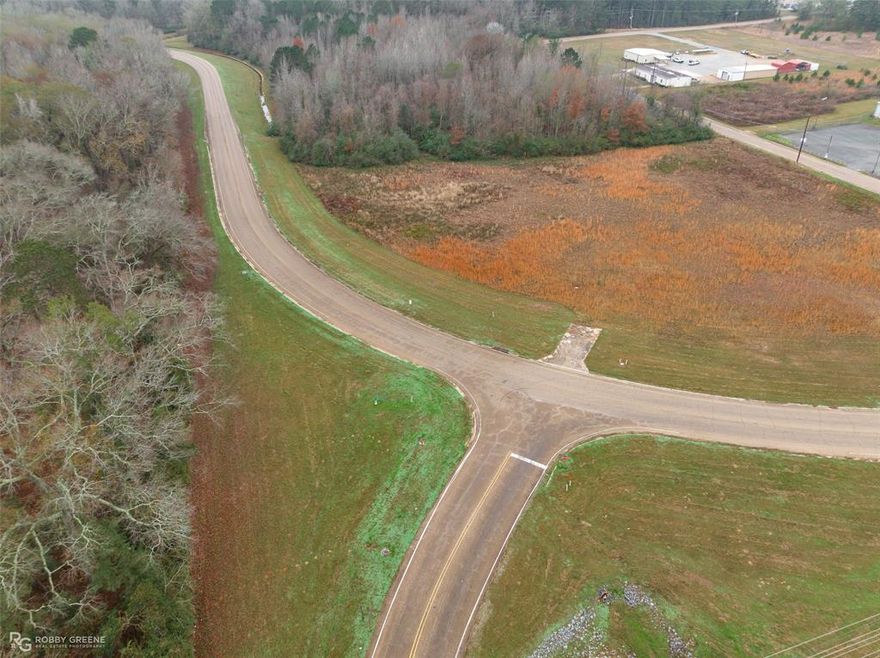 Welcome to this incredible opportunity to own 27 acres of prime commercial land! This expansive property is located in a highly desirable area, offering an excellent investment opportunity for any entrepreneur or developer looking to establish a thriving business. Boasting a diverse terrain with lush vegetation, this parcel offers endless possibilities for development. With easy access to major highways and ample frontage on a well-traveled road, this location is ideal for businesses that require high visibility and accessibility. The property is zoned for commercial use, making it suitable for a wide range of ventures, including retail, industrial, hospitality, or office space. The vast size of this property allows for ample parking, loading docks, or outdoor storage areas, depending on the needs of the buyer. There is also an additional 27.35 acres available on West side of Industrial Dr.