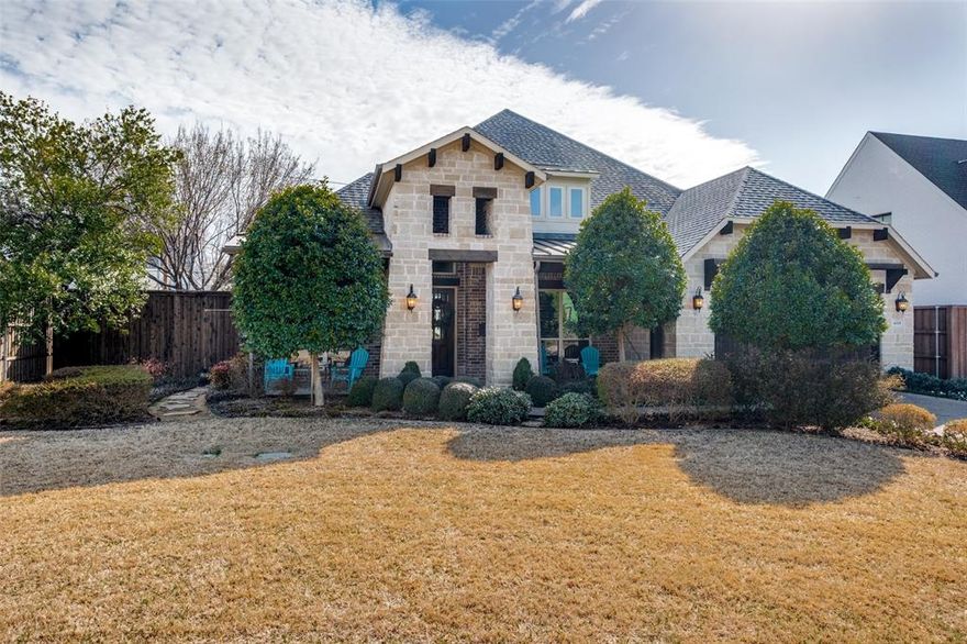 Built in 2015 and thoughtfully designed with ADA-compliant features, this beautifully maintained home offers comfort and functionality in highly sought-after Midway Hollow.

The flexible floor plan includes three generously sized bedrooms, a private library-study, two full baths, and a powder bath. The open living and dining spaces are complemented by a well-appointed bar area and flow seamlessly to a covered outdoor living space with a fireplace, creating an effortless indoor-outdoor lifestyle.
Stone exterior, mature trees, and curated landscaping make for fantastic curb appeal. This home blends quality construction with modern livability in one of Dallas’ most desirable neighborhoods of Midway Hollow.