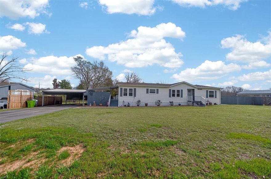 Welcome to this beautifully maintained and updated 3-bedroom, 2-bath home on .615 acres in Chandler, Texas, offering the perfect blend of comfort, space, and functionality. Inside, you’ll find a warm and inviting layout along with almost-new appliances, and the refrigerator conveys with the home, making it truly move-in ready.

Step outside to enjoy the covered patio, an ideal spot for BBQs, entertaining, or simply relaxing while taking in the peaceful surroundings of this quiet neighborhood. The fully fenced backyard provides plenty of room for pets, gardening, or outdoor activities.

This property also offers exceptional workspace and storage options, including a carport, a fully insulated double-bay workshop, an additional workshop, and a separate storage building in the backyard—perfect for hobbies, projects, or extra equipment.

With acreage, multiple workshops, modern updates, and a peaceful setting, this Chandler property offers the space and flexibility that’s hard to find.