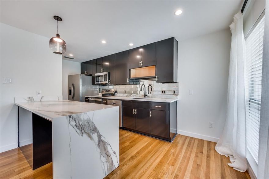 Recently renovated with chic urban style, includes refreshed kitchen and bath with all new appliances. Stacked unit WD included. Bedroom has a balcony and two closets including a large walk-in. Huge windows overlook gorgeous pool and trees!
Courtyard grounds include water feature, lighted sidewalks and pet area. HOA includes water. Easy to show!