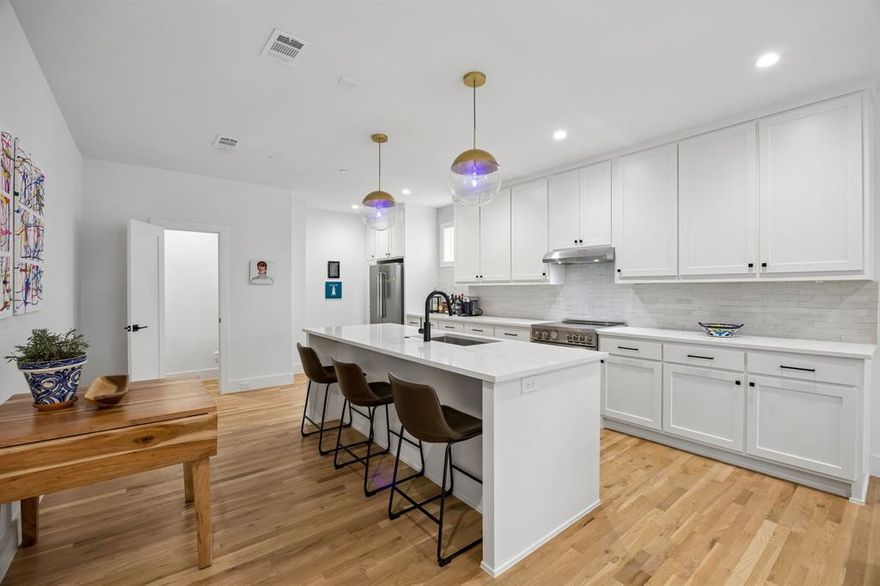 Situated in the heart of Lakewood, this beautifully designed condo blends modern style with effortless comfort in one of Dallas’ most desirable neighborhoods. Located just moments from the scenic trails and recreation of White Rock Lake, this home offers convenient access to miles of biking, running, kayaking, and outdoor exploration.
Inside, the light filled open layout showcases wide plank white oak flooring that flows seamlessly throughout, creating a warm and sophisticated feel. The kitchen is thoughtfully designed for both everyday living and entertaining, featuring a pristine white quartz island and countertops, decorative glazed tile backsplash, classic white shaker cabinetry, and premium stainless steel appliances including a Bertazzoni 36 inch French door refrigerator, induction range, undermount microwave, and sleek under mount sink.
The inviting living area is bright and welcoming with abundant natural light and easy access to the private balcony. The spacious primary suite features a double vanity and an oversized glass walk in shower with designer tile finishes. The secondary bedroom offers architectural character with a striking vaulted ceiling.
The community offers direct access to the scenic Santa Fe Trail, connecting residents to the extensive trail system surrounding White Rock Lake and nearby outdoor destinations including the beautiful Dallas Arboretum and Botanical Garden.
Additional upgrades include Cat5 wiring, epoxy coated garage floor, and HOA coverage that includes water, trash, sewer, and internet. Conveniently located near neighborhood dining, shopping, and the prestigious Lakewood Country Club, this home offers the ideal combination of modern comfort, low maintenance living, and close proximity to everything that makes Lakewood one of Dallas’ most desirable neighborhoods.