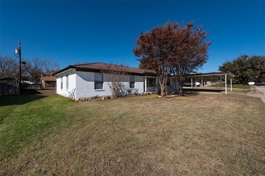 Step into this beautifully updated 3-bedroom, 1.5-bathroom ranch-style home nestled in the heart of Hamilton, TX. The newly painted exterior offers a fresh, modern curb appeal, setting the stage for what lies inside. Rich luxury vinyl plank flooring flows seamlessly throughout, creating a warm and inviting atmosphere. The kitchen is a chef's delight, boasting crisp white cabinetry, sleek stainless steel appliances, and plenty of space for meal prep and gatherings. Relax in the upgraded full bathroom, where modern finishes shine, or enjoy the convenience of the updated half bath. Each bedroom offers comfort and charm, ideal for family living or hosting guests. Perfectly blending timeless charm with contemporary upgrades, this home is ready to welcome you. Don't miss the opportunity to make it yours!