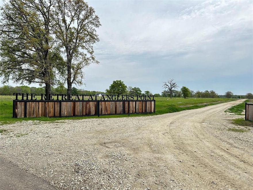 Discover the charm of lakeside living with this exceptional waterfront property in The Retreat at Angler's Point, nestled on the shores of Lake Fork. This prime lot, part of one of the newest neighborhoods around Lake Fork, offers an elevated position that promises stunning lake vistas and ample space to relish the great outdoors. You have a blank canvas awaiting your vision to craft the perfect lakeside residence on approx 1 acre adorned with mature trees. The property's gentle slope leads down to Lake Fork, allowing for the construction of your private pier and boathouse. This lot stands as a promising investment in what's set to become a standout destination. With utilities ready for connection, and Lake Fork's renowned fishing scene, this spot is ideal for fishing enthusiasts or those seeking the tranquility of waterfront living. An easy drive from the Dallas area, making it an ideal retreat. Plus, with proximity to nearby towns, you're never far from dining and entertainment opt.