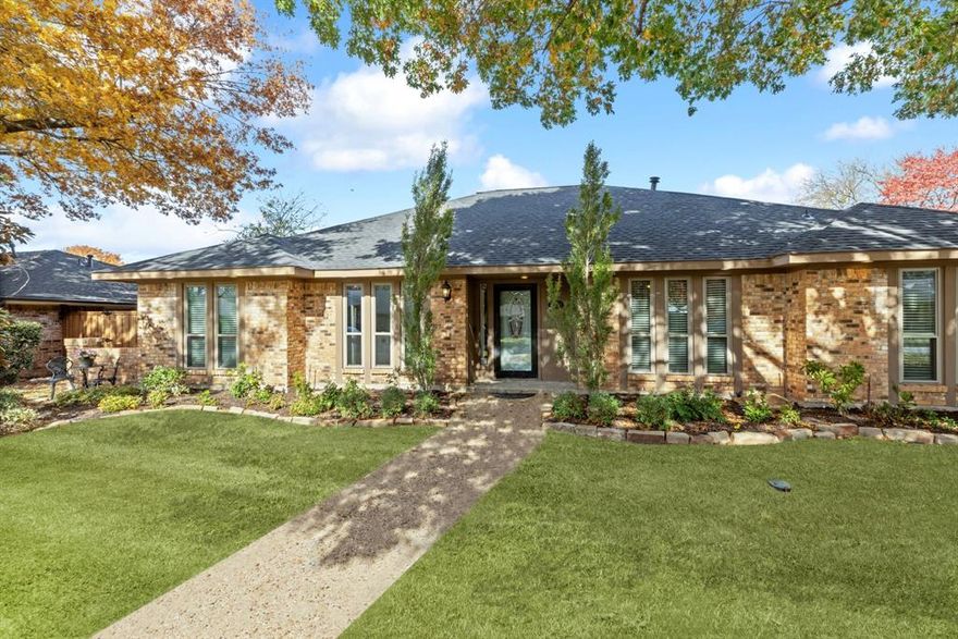 This charming home offers the BEST OF BOTH WORLDS: an established south Plano neighborhood with mature trees convenient to EVERYTHING (including walking distance to 10 grades of Plano schools) AND... ALL THE HARD WORK IS DONE! The list of high-ticket improvements is long including double hung vinyl clad windows, roof+gutters installed 2023; two water heaters replaced; 16 SEER HVAC; upgraded electrical panel and TESLA managed Solar panels that keep electric bills low! Awesome saltwater pool built in 2018 with electronic controls using your phone! Lovely drive-up appeal starts with large shade trees, aggregate walk and professionally landscaped flowerbeds and lighting. Inside you'll find mostly tile floors for easy maintenance and a spacious open floorplan with THREE large living areas, formal dining (could also be a study), big walk-in wet bar and the owner's suite tucked on the back of the home for privacy.  There are THREE full baths PLUS a powder room and built-ins galore. It's a 10!