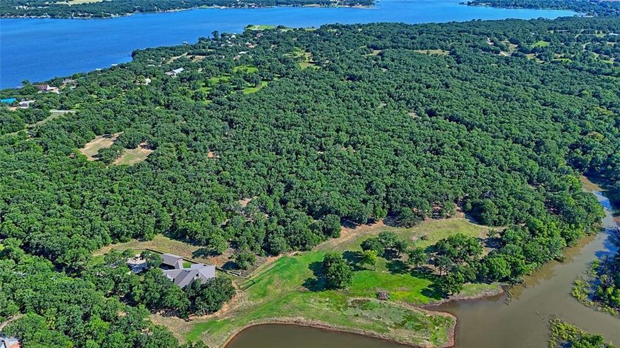 Waterfront acreage located on the west side of Lake Nocona and one of the largest waterfront properties to come on the market in many years. This 21.05 acre property has water frontage on lake Nocona, multiple build sites, mature oak trees, plus road frontage on Tradewinds Rd and Private Road 460. The rolling terrain of this land and the many beautiful trees make this a blank canvas with character to make into the property of your dreams. There are many well maintained homes and properties on this side of the lake and a public boat ramp less than a mile away to launch your boat. Come see what this property has to offer as the possibilities are endless.