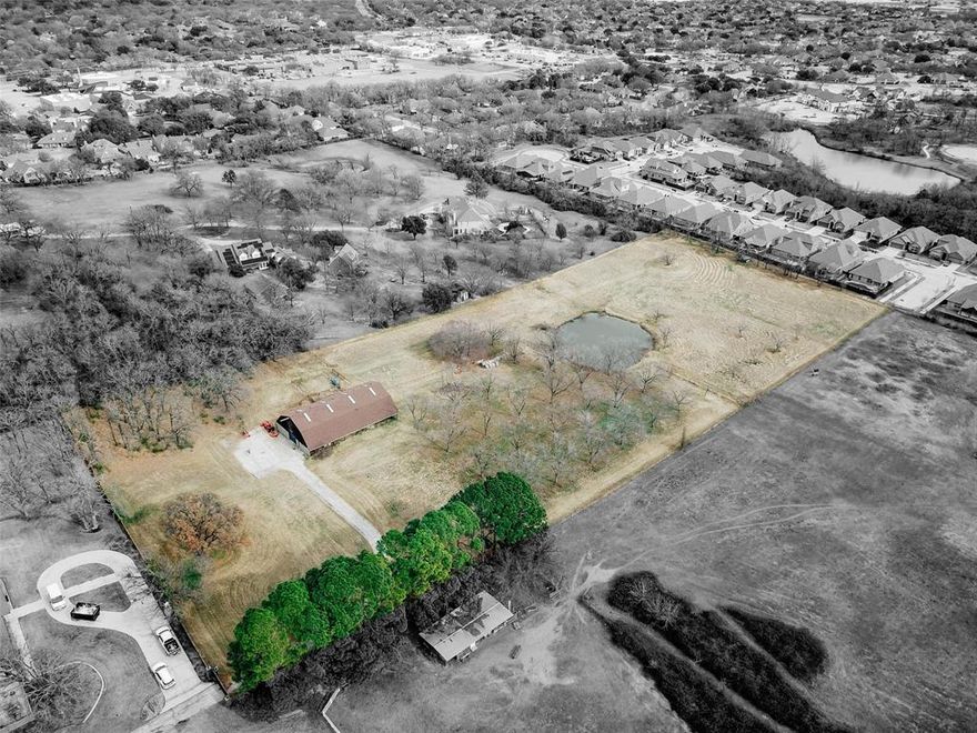 Rare opportunity to own 5.87 acres of beautiful land in one of South Denton’s most sought-after areas. This exceptional property features a mature pecan orchard and a peaceful pond, offering natural beauty and a rich history as a former ranch where Clydesdale horses were once raised. With access from El Cielito Street within the Montecito neighborhood and additional frontage on the opposite side of the property, this tract provides
outstanding flexibility for future use.

The setting is truly unique—bordered by well-established homes on large, estate-sized lots in Montecito on one side, while the other side backs up to an existing residential development, creating a rare blend of privacy, prestige, and proximity. Whether envisioned as the site for a private dream home or an incredible development opportunity in a rapidly growing and highly desirable area, this land offers exceptional potential. Acreage of this size, character, and location is extremely rare in Denton and seldom becomes available.