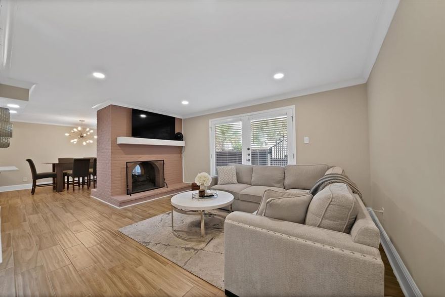 First-floor corner condo in the desirable Tuscany Condominiums, offering comfort, style, and an unbeatable East Dallas location. This updated 2-bedroom, 2-bath home features tile flooring throughout, abundant natural light, and a spacious open layout designed for both everyday living and entertaining. A double-sided fireplace creates a warm focal point between the living and dining areas. The kitchen includes stainless steel appliances, quartz countertops, ample prep space, and excellent functionality. French doors open to two private patios, ideal for relaxing, entertaining, or pets. The primary suite offers a walk-in closet and private bath, while the secondary bedroom is perfect for guests or a home office. Refrigerator, washer, and dryer convey with the property. Two covered parking spaces are conveniently located near the rear entrance. Tuscany Condominiums features gated access and Resort-Style Amenities including a pool, spa, fitness center, grilling areas, fountains, and beautifully landscaped courtyards! Prime location near SMU, Central Market, Lower Greenville, Mockingbird Station, White Rock Lake, Katy Trail access, and some of Dallas’ best dining, shopping, and entertainment.
