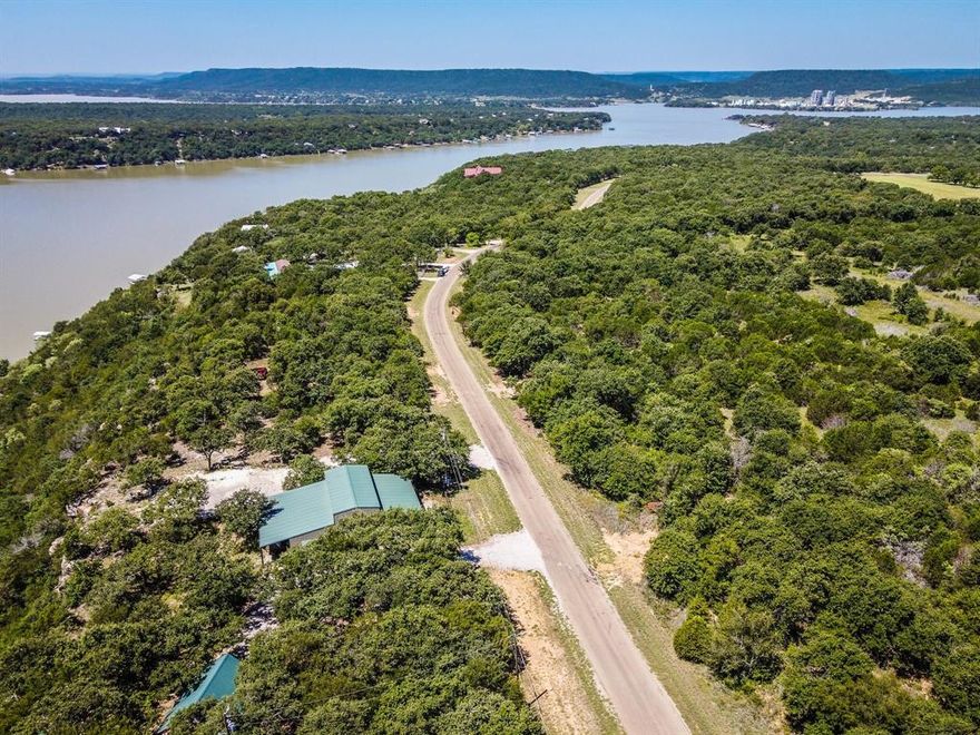 Beautiful homesites available to build your dream home.  All lots directly across the road from the lake and within a couple minutes drive to the boat dock. Come to the country, stay for the small town feel. Water meter has been set on this lot. 13 1+ acre lots available at this price. Deed restrictions include No mobile homes. Please see attachments for lot measurements.
