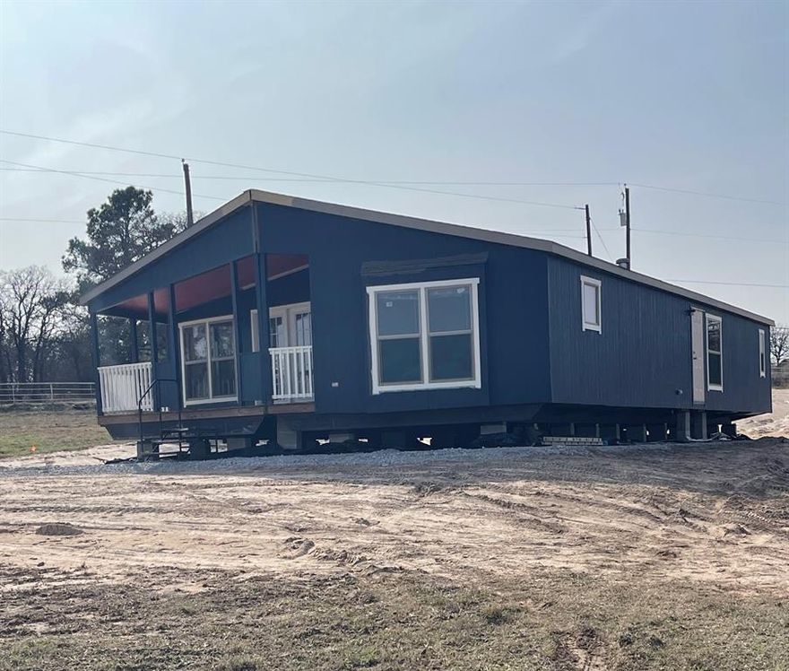 COMING Soon!! Under Construction.
This beautiful Heritage 32x64 is a meticulously crafted manufactured home offering 1,789 sq.ft. of spacious living on an acre of land with a 2-car carport. This well-designed floorplan provides ample space for families or those that just enjoy extra room. This home offers you the feeling of peace and tranquility. Other features include built-in desk in kitchen and in the hall. Also, stone enclosed electric fireplace and stone front island.
The community has a 3-4 acre catch and release fishing pond, community garden and the enjoyment of our beautiful horses and donkeys.