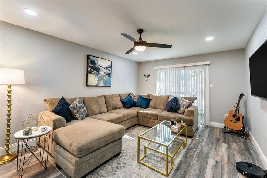 This beautifully updated poolside condo is the perfect blend of style and convenience. Step into a custom kitchen featuring quartz countertops, luxury slate appliances, and a built-in wine cooler—ideal for everyday living and entertaining. The open layout is enhanced by elegant flooring throughout (no carpet), modern lighting, designer paint, updated doors—including sleek barn doors—and upgraded baseboards.

Both bathrooms showcase stylish tile work and contemporary vanities. Enjoy natural light through new windows and a sliding glass door that opens to your private patio with relaxing pool views. A built-in laundry area adds everyday functionality.

Located on the first floor, this 2-bedroom, 2-bath unit is just minutes from shops, restaurants, and entertainment. Whether you're looking for a modern move-in-ready home, a student retreat near SMU, or a smart investment property—this condo checks all the boxes.

Washer, Dryer, Refrigerator and Wine Fridge all convey!