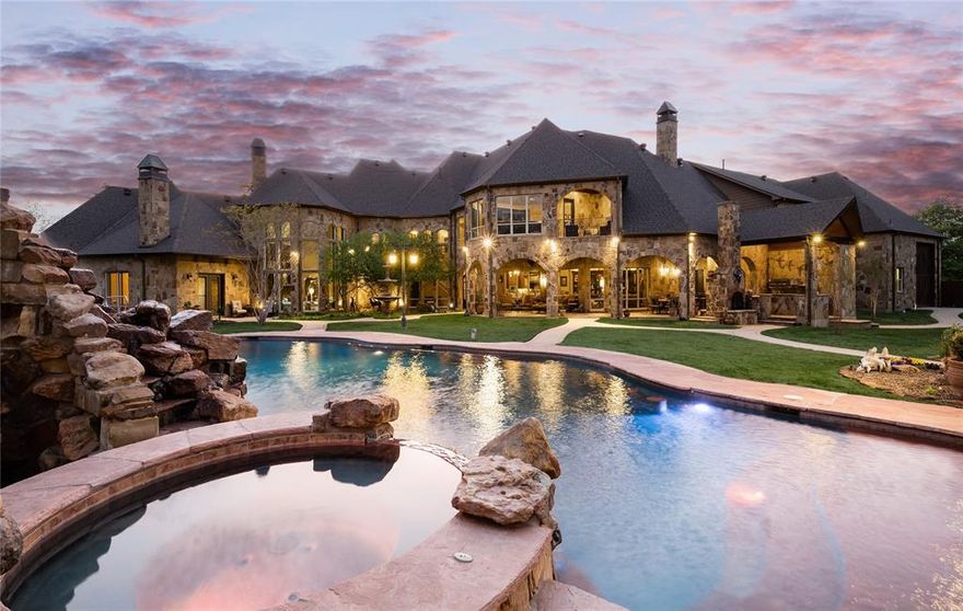 One of Argyle's premier estates featuring a private resort setting on a quiet cul-de-sac. Every inch of this custom gated property has been thoughtfully designed w ease + function to thoroughly enjoy the expansive indoor, outdoor entertaining venues and acreage. Floor to ceiling windows, high ceilings, top of the line construction and unmatched features throughout. This stunning one of a kind property features it's own water well, fully fenced + landscaped w room for barn + horses, 6 car + 50ft motor coach garage, separate quarters, 5 living areas, 2 indoor kitchens + a full outdoor restaurant grade kitchen, 3 outdoor covered verandas, stone fire pit, 90ft resort pool, spa + custom water slide and a lg stocked fishing pond. 2022 roof, all new gutters, X4 AC units,Wi-Fi thermostats,14in insulation and Sonos thru out.One of the most tranquil and peaceful settings in Argyle to call home, minutes to Liberty Christian, Argyle High, Denton Country Club. See agent for detail list of upgrades.