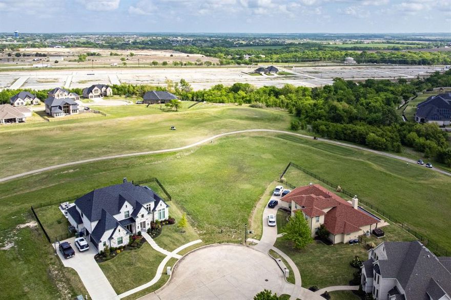 Rare opportunity to secure one of the last great golf course lots in The Bridges. This nearly half-acre homesite sits at the back of a quiet cul-de-sac with no through-traffic, offering wide-angle views of the Fred Couples signature course. You’re just minutes from the new elementary school and zoned for the rest of exemplary Gunter ISD. Use the builder of your choice and build on your own timeline with no mandated start date. The neighborhood features a 4,000 sq ft fitness center, tennis, and resort pools, with optional golf memberships available. This is a high-elevation lot in the heart of Gunter. Don’t wait for the next phase, secure the best view in the cul-de-sac today.