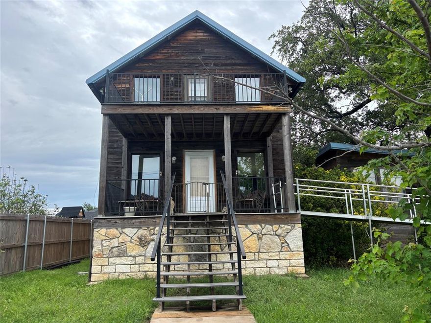 Unique property with endless potential! This 2-story home features 2 bedrooms and 2 bathrooms upstairs, including a private balcony off the primary bedroom with elevator lift access. Enjoy relaxing on the covered front porch or unwind in the sunroom featuring an indoor enclosed hot tub. The home also offers convenient thru-kitchen access and a small basement for additional storage or workspace.

Outside, you’ll find an oversized 2-car garage, shop with an RV bay, complete with water and electricity, plus abundant storage space in the loft above the shop. Situated on a large lot shaded by mature, beautiful oak trees, this property is being SOLD AS IS and offers an incredible opportunity for investors, flippers, or buyers ready to add their personal touch.