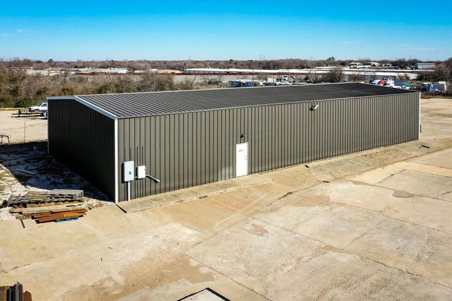 Prime Commercial Opportunity in Kennedale, Texas: Modern Facilities on Spacious Land! These (3) 5,000 sqft. metal buildings are nestled on 5.71 acres, with a secure gated drive. Buildings feature 15 ft. ceilings, 14 ft. wide sliding bay doors, and insulated walls for energy efficiency, each building houses 2 bathrooms and a designated office space. Illuminated with LED lighting and powered by 120-208 3-face power in two of the buildings. Enjoy the ease of keypad entry as you navigate the ample cemented parking area. With two buildings currently leased, this is an investment opportunity not to be missed! Schedule a tour today, call the listing agent. Age of the buildings are approximately 2017.