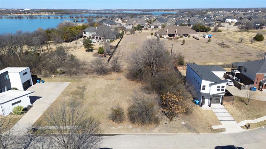 Rare Opportunity to Build in a Prime Location Near Lake Ray Hubbard. This zoned and platted lot offers utility available at the street including water, sewer, and electricity—making it truly ready for development. Just minutes from the sparkling waters of Lake Ray Hubbard, this hard-to-find parcel delivers the perfect balance of outdoor enjoyment and urban convenience. Enjoy boating, fishing, scenic sunsets, and lakeside recreation without the premium of direct waterfront pricing. Situated on over a quarter of an acre, this spacious homesite provides endless potential for your custom residence or development vision. Conveniently located near Dallas, the area features abundant parks, recreational amenities, golf courses, and a wide selection of shopping and dining destinations. Nestled in a quiet, peaceful neighborhood with easy access to major highways including I-30 and President George Bush Turnpike, commuting is effortless while privacy is preserved. Whether you’re planning to build your dream home or invest in future growth, this exceptional lot is the perfect canvas to bring your plans to life. All information deemed reliable but not guaranteed. Buyer and buyer’s agent to verify schools, zoning, permits, utilities, and building requirements.