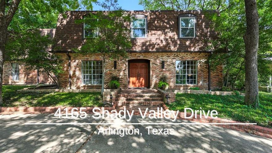 Prestigious Shady Valley Estates French Chateau

In one of Arlington’s most coveted neighborhoods, this sprawling French chateau in Shady Valley Estates sits on an oversized lot shaded by mature trees, with peaceful golf course views right out front. The location? Absolutely unbeatable. You’re just 10 minutes from Arlington’s Entertainment District, 30 minutes from Dallas or Fort Worth, and practically a chip shot away from Shady Valley Country Club and Golf Course.

Inside, you’ll find a home that’s all charm with just the right amount of character. Real brick floors stretch through the formal and casual living spaces, and thanks to the new smart home lighting, every room can be as bright as your future here. Cozy up next to one of the two fireplaces on chilly evenings or host the dinner party of the year in the oversized dining room that easily seats twelve...with a chef’s kitchen ready to rise to the occasion. Stainless steel appliances, farm and prep sinks, endless storage, and counter space for days mean you can handle anything from Tuesday tacos to Thanksgiving feasts.

Upstairs, there’s room for everyone. A media room for movie nights or gaming marathons, a spacious flex room with a wet bar for playtime, homework, or a second living area, plus a second primary suite with golf course views — perfect for in-laws, guests, or anyone who just loves a good view.

Need even more space? The private apartment or office suite above the garage is ideal for guests, college kids, au pairs, or even a home-based business.

Step outside and you’ll find plenty of places to relax and entertain — a covered porch, a fire pit, a roomy deck, and a generously sized backyard. And when that still isn’t enough, there’s extra green space right across the street for even more room to play.

This home blends elegance, personality, and a location that’s second to none — a true Shady Valley gem that checks all the boxes.