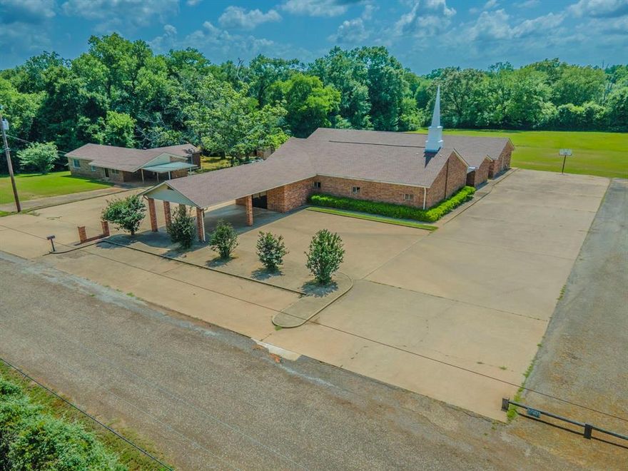 Welcome to a unique opportunity on the outskirts of Palestine, Texas — a spacious and well-structured former church building ready for its next chapter. Nestled in a quiet and welcoming community, this vacant property offers solid bones and a wealth of adaptable space, ideal for a wide variety of uses. Inside, you'll find a large open sanctuary or event area, perfect for worship services, community gatherings, or performance space. The building also features a spacious kitchen, multiple private offices, a generous dining area, and various flexible-use sections throughout.
Whether you're envisioning a new congregation, a childcare center, educational facility, therapist offices, non-profit headquarters, or another commercial venture, this property provides the layout, location, and potential to bring your vision to life. With its serene setting and multi-use layout, this building is more than just a former church — it's a canvas for purpose-driven innovation in a community ready to welcome your next idea. Schedule a private tour and see how this property can serve your mission or business.