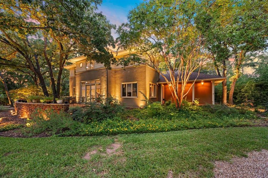 OPEN DEC.13TH, SAT. 1-3 PM. Tucked into one of the most private one acre cul-de-sac lots in Southlake, this Frank Loyd Wright prairie, craftsman style home offers a rare blend of mountain inspired warmth & clean contemporary lines. It truly has something for everyone. From the welcoming front entry to the soaring ceilings, dramatic back windows & stone fireplace in the living area, this home exudes character & comfort. Rich wood flooring flows extensively downstairs, complementing the rich shaker style cabinetry & high-end Thermador & SubZero appliances in the kitchen — boasting a double oven with convection, 6 burner gas cooktop, trash compactor, a large eat-in dining breakfast bar & more. The private primary suite is truly a retreat, featuring its own fireplace & and a serene look out into the lush backyard retreat. The ensuite bath offers a spa-like indulgence with a remodeled oversized shower with 3 heads, bench seating, in addition to the luxurious tub sitting amongst a wall of windows, & serene ambiance—truly bringing the outdoors in. This unique getaway provides the perfect spot for luxuriating & unwinding with coffee in the morning or stargazing at night. Thoughtful features also include a downstairs mixed use secondary bedroom, a dining room built in dry bar & well-designed primary bathroom suite upgrade, adding function to form. The home also boasts an upstairs with multiple bedrooms, living spaces, reading nooks & an indoor outdoor space that allows for getting away, journaling or taking in your focused workout. Out back, you’ll also find an outdoor pergola, multiple entertaining and living spaces, as well as flagstone walkways, an outdoor fire-pit, private garden oasis, mature landscaping, & more room to entertain or simply enjoy a peaceful moment. Every detail of this unique home has been carefully curated for those who appreciate both beauty & functionality. It's a one-of-a-kind property that invites you to slow down, settle in, & savor the good life.