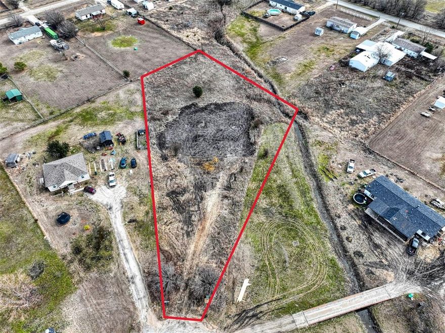 Build your vision on this vacant residential lot located at 3099 Shanda Ct, Kaufman, TX 75142. Situated on a quiet cul-de-sac, this property offers a peaceful setting with the convenience of nearby schools, shopping, dining, and easy access to major highways for commuting. The lot provides a great opportunity for a custom single-family home or long-term investment, subject to city zoning and building requirements. Utilities are available nearby (buyer to verify), and the surrounding area features established homes with continued growth and development. Ideal for builders, investors, or end users looking to create a home in a growing Kaufman community.