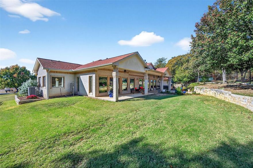 One-of-a-Kind Lake Kiowa Gem on Triple Lot with Two Master Suites. Nestled on a serene 1.57-acre triple lot on the north side of Lake Kiowa, this Southwest-style home offers privacy, space, and character at every turn. From the moment you step inside, you’ll be captivated by the custom details, beautiful tile flooring, handcrafted tree-post accents, unique sconces & formal den.The primary master suite is truly a retreat, featuring room for a sitting area, seperate vanities plus a dedicated makeup vanity, a corner jetted tub, a custom walk-in shower and an extraordinary closet complete with built-in storage, seasonal upper shelving & shoe rack. The 2nd master suite offers its own luxury touches with dual vanities, a corner tub, a glass walk-in shower & walk in closet. Designed for both comfort and entertaining, the open living area includes a brick gas fireplace, hardwood floors, a built-in coffee bar, and a wall of windows that frame views of your beautiful private backyard. The kitchen opens to the living space and features stainless steel appliances, a gas cooktop, a long breakfast bar, and abundant counter space. You’ll also find a formal dining room & a dedicated office with extensive built-ins and a built-in desk. Step outside to your backyard oasis, complete with a covered patio stretching nearly the full width of the home. Enjoy views of mature trees within your fully fenced yard, enclosed by black wrought iron fencing with concrete footers for durability. A separate dog run includes a climate-controlled dog room (which could double as a workshop) just off the secondary garage. Above the main garage, discover a air conditioned and heated game room or man cave or also perfect for a fourth bedroom, media room, or private retreat. Both garages are generously sized. With its blend of craftsmanship, comfort and privacy, this Lake Kiowa treasure is a must have. Schedule a showing today and experience all that this remarkable home has to offer.