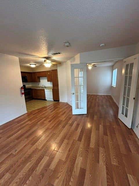 Photo of 9839 Walnut Street #T103, Dallas, TX 75243 (MLS # 21329305)