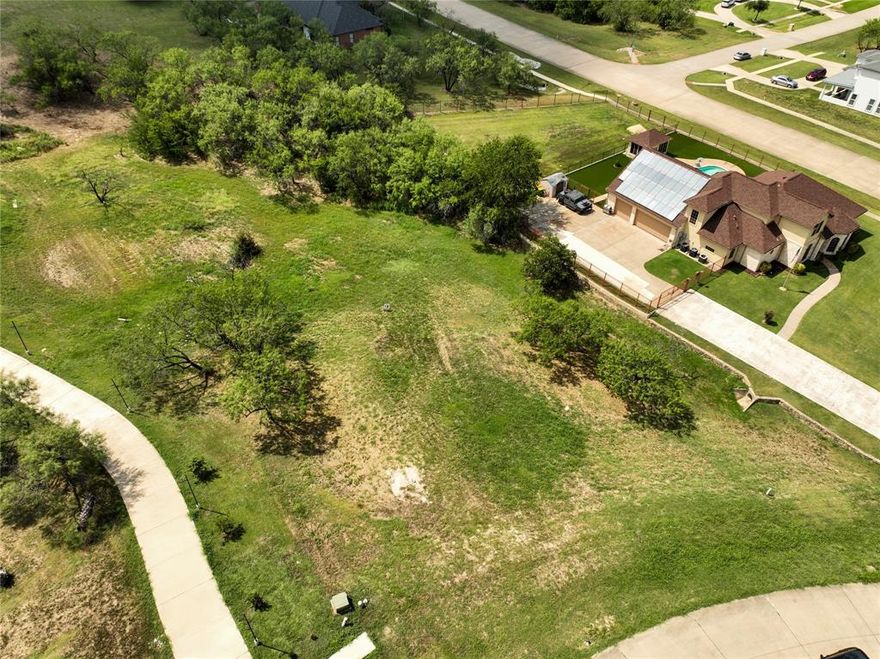 Lot available to build your dream home! Located in the sought-after community of Lake Ridge.  Midlothian schools.  Conveniently located between Dallas and Fort Worth, and just minutes for Joe Pool Lake, Tangle Ridge Golf Course, multiple pars, playground, walking trails and Lynn Creek Marian.