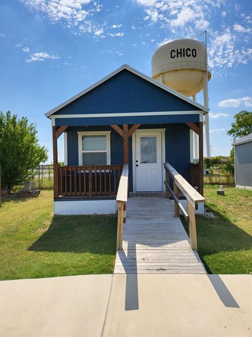 Adorable tiny home in the heart of Wise County available for immediate move in. Features one private bedroom and a full bathroom with an upstairs loft. Landlord provides electric range and refrigerator. Stackable washer and dryer available for rent during the term of the lease. Monthly rent includes water, sewer, and trash service paid by landlord. Electric to be paid by tenant. Up to one pet allowed per home with additional deposit. Central heat and air. Cozy covered front porch. Private 100 sq ft storage closet provided at no additional charge. Ample off-street parking. Convenient to both Bridgeport and Decatur. Additional storage available.