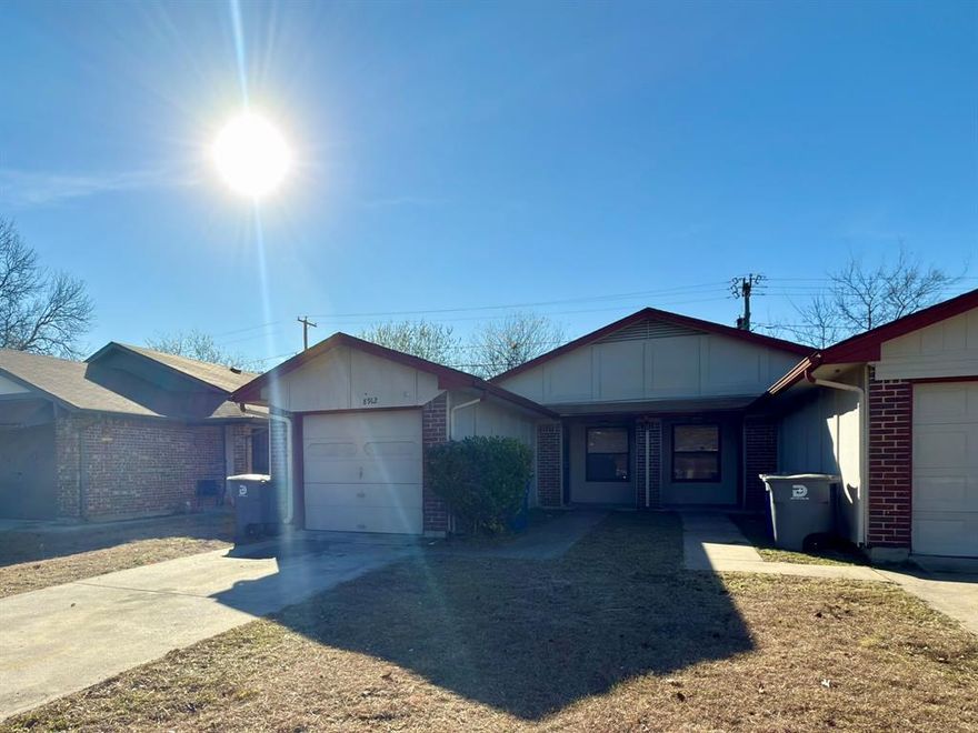 See 3D Virtual Tour! Fully renovated duplex unit that lives like a single family home! This unit features an open floor plan with wood like flooring, designer paint and trim color, updated kitchen and baths, and lots of storage space. Large fenced yard, garage, washer dryer connections, and a convenient location steps away from a park and school!