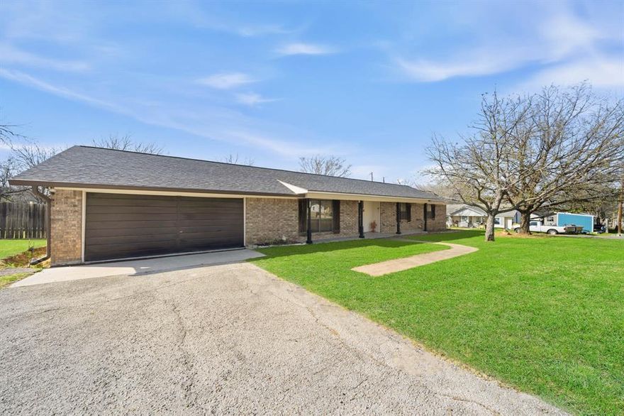 3 bedroom 2 bath home on a spacious lot in Valley Mills.  This home has a traditional formal dining room area off the entry.  This space could also be used as a den if needed.  The living room has a wood burning fireplace and is located right off the kitchen.  The kitchen has a breakfest area with enough room for a small table. Seperate laundry room big enough for a full size washer and dryer plus upper cabinets.  Master bedroom has an attached bath with tiled shower and single vanity.  Two guest bedrooms and a guest bathroom in the hallway.  Outside there is a huge backyard fully fenced.  A metal storage building that will convey and an attached 2 car garage with a storage room inside.  The roof is approx 2 years old.  Home has lots of potential and offers plenty of outside space on a corner lot.