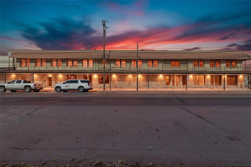 Don't miss out on this remarkable chance to own a slice of historic downtown Dublin, Texas! The Bob Evans Hotel beckons with approximately 16,940 sqft. This includes around 8,499 square feet on the ground floor, & 8,441 square feet on the upper level. Upstairs, discover approximately 4,293 sqft of finished living space, with a large workshop & ample room for additional residential or commercial space. The finished living area has five bedrooms & three bathrooms. Boasting ample indoor & outdoor gathering spaces, it is ideal for entertaining. The open-concept layout showcases a spacious kitchen with custom cabinets, granite countertops, & a large island with more storage. Downstairs showcases a versatile 4,148 square feet comprised of an occupied residential rental & endless commercial potential with multiple existing entrances on Blackjack that could be combined, or kept as separate units.  The size & location of the building offer endless investment strategies within one building and is in a designated opportunity zone.