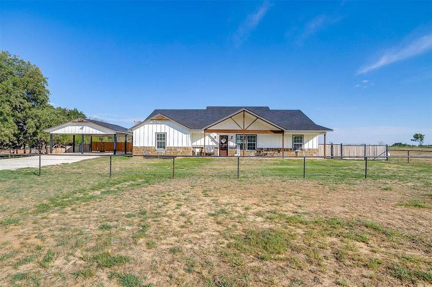 Welcome to your private piece of paradise that is just minutes South of Fort Worth! This property sits on 6.24 AG Exempt acres that has many trees, with wildlife, and open level pastures. The entire property is fenced around the perimeter with a cattle guard at the entrance and fenced again around the house with an additional cattle guard.  This four-bedroom board and batten and stone home boasts incredible curb appeal, and the inside is ideal for entertaining and day-to-day living with a spacious open floor plan. Plenty of counter space, custom cabinets, and a large island complete the kitchen. Stained concrete floors throughout and a large laundry room-mud room. Master retreat features a door to the back porch, a huge walk-in closet, separate shower, garden tub and double sink vanity. Amazing fenced in backyard with covered patio perfect for hosting and barbeques.  An additional 17.5-acre Ranch is available next door.
