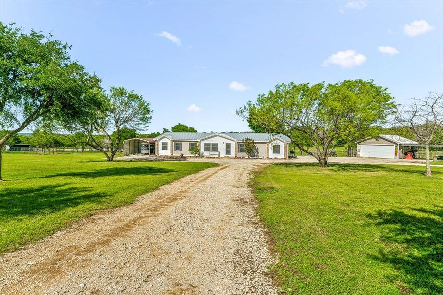 Escape to your perfect turn-key getaway at this idyllic 235-acre ranch with a FULLY FURNISHED home that is already set up for you and all your guests just minutes to Jacksboro. The 235 acres has perimeter fencing, cattle working pens, multiple storage sheds, 30x40 equipment barn, detatched two-car garage, multiple hunting blinds and feeders, two fenced feed plots, and 3 tanks stocked with bass, crapie, and catfish. Great deer, turkey, pig and dove hunting. The home is a 32x76 4 bedroom home with a bonus room and a 900sq ft porch perfect for entertaining.
