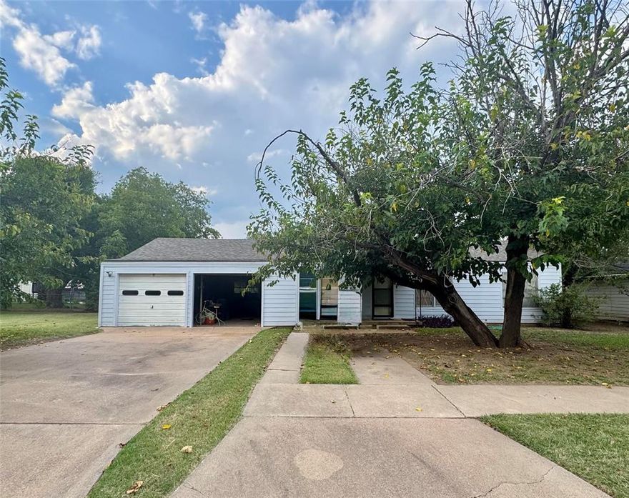 This house has good possibilities.  Two bedroom One bath with great hardwood floors.  Double Car garage, and recently replaced roof and siding.  Located on two lots, the back yard is fenced with a carport and entry from the alley.  The house still has personal property on site and will be removed.  Good neighborhood in Albany, Texas.
