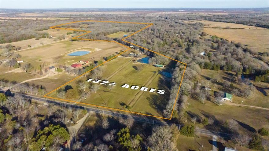 'STRAIGHT OUT OF A YELLOWSTONE EPISODE...GREAT BLUE HERON RANCH * TURN KEY'...132.57 ACRES w-Improved Pastures, 6 Stocked Ponds, Spring-Fed Creek, Completely Fended & Cross Fenced, Wooded, Open Pastures for Grazing * AG EXEMPT w-LOW PROPERTY TAXES...Close to Red River & Less Than 30 Miles to Choctaw Casino * Minutes from Bois D'Arc Lake, Lake Bonham, Sam Rayburn Reservior * Main Residence, Metal Ranch House--1,200 SF * 2 Bedrooms * 1 Bath * Living Rm, Clng Fan, Electric FP * Kitchen, Refrig, Stove Gas Cooktop-Oven * Bath w-Shower * Separate Utility Rm w-Washer & Electric Dryer *Hot Water Htr, 1 Yr Old*HVAC, 2022*Propane Heat*Central AC*2nd Residence Barndo w-Carport--1,200+ SF * 1 Bedroom*1 Bath*Propane Hot Water Heater*Window Units*Dearborn Space Htr*Storage Shed*50x25 Pole Barn-Loafing Shed*Fannin County Electricity Coop*2 Wells*Storm Shelter*Timber Rights Convey*ALL Equipment & Furniture Remains*12 Cows.1 Bull,All Calves Under 5 Months Included w-Sale*Easy Commute from Dallas & Remaining Suburbs.
