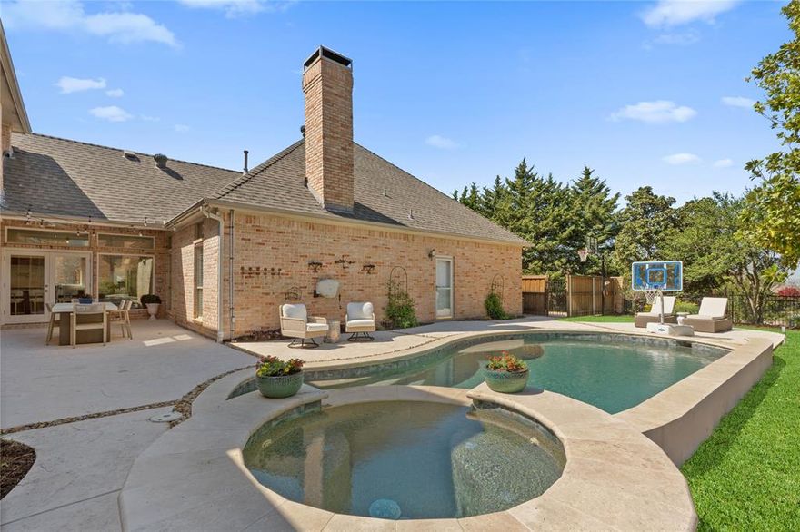 Beautifully renovated and thoughtfully designed, this stunning 5-bedroom home offers the perfect blend of luxury, comfort, and everyday livability in the highly sought-after Stonebridge Ranch, with access to top-rated schools and resort-style amenities. Featuring 3 full baths and 2 half baths, the flexible floor plan is ideal for modern living, with the primary suite, office, and a guest bedroom all conveniently located on the first floor—perfect for both families and guests. At the heart of the home, the designer kitchen is truly exceptional, showcasing elegant Oyster White marble countertops, a 48-inch range with statement hood vent, built-in refrigerator, warming drawer and microwave drawer. Thoughtfully designed custom cabinetry includes a built-in charging drawer, dedicated pots and pans drawers, sheet pan storage, a coffee station, pull-out trash cans, and specialized spice and utensil pull-outs—blending high-end design with everyday functionality. An oversized walk-in pantry completes this incredible space, making it perfect for both daily living and entertaining. Multiple living areas invite you to relax and connect, enhanced by two newly designed fireplace facades—limestone in the family room and porcelain tile in the front living room—along with a third fireplace in the serene primary suite. Custom built-ins in the family room, complete with rich walnut shelves and undermount lighting, add warmth and sophistication. Step outside to your own private retreat where a luxurious, newly updated pool and spa await, featuring travertine coping and a fully retiled finish—perfect for summer days, family fun, or evening entertaining. Additional highlights include an oversized 3-car garage with plumbing already in place, offering endless possibilities for a new owner to build a dog wash or convenient post-pool shower. Located in the most desirable Stonebridge Ranch community. 
Back on the market due to no fault of the seller.
