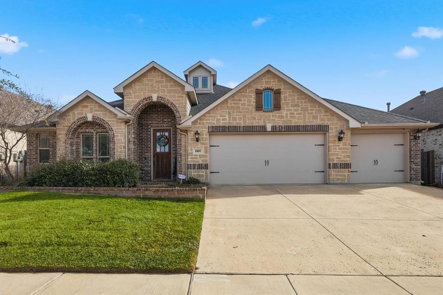 Welcome to this beautiful 4-bedroom, 3-bath home located in the highly sought-after Country Lakes community in Denton. Built in 2020, this 2,759 sq ft open-concept home offers a thoughtful layout designed for both everyday living and entertaining. The heart of the home features a deluxe kitchen with a double oven, quiet dishwasher, ample cabinetry, and generous counter space—perfect for hosting family and friends. Wood look tile flooring flows throughout the main living areas, complemented by a cozy gas fireplace that adds warmth and charm to the living room. The spacious primary suite serves as a private retreat, complete with a spa-like bathroom and rain shower for ultimate relaxation. Step outside to enjoy an extended concrete patio overlooking an open field with no homes behind, offering rare privacy and peaceful views. Recent upgrades include a new impact-resistant roof installed in October 2025, providing added durability and peace of mind. A rare 3-car garage offers plenty of space for vehicles, storage, or hobbies. Country Lakes residents enjoy access to top-rated schools, scenic walking trails, fishing ponds, and two community pools. Ideally located near Denton with easy access to Dallas and Fort Worth, this inviting, well-maintained home is truly move-in ready.