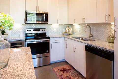 Photo of 6000 Gaston Avenue #214, Dallas, TX 75214 (MLS # 21351760)